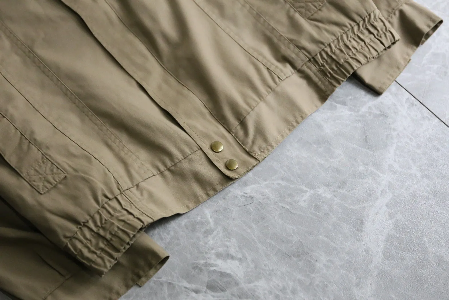 thin beige blouson