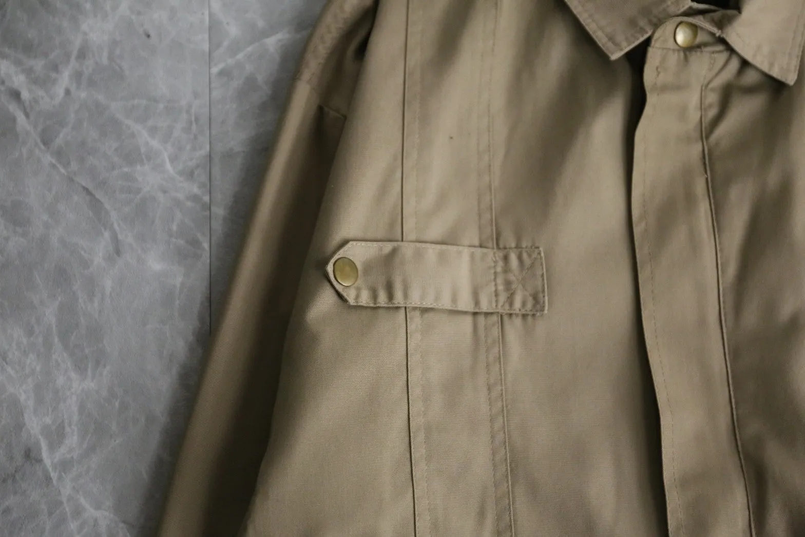 thin beige blouson