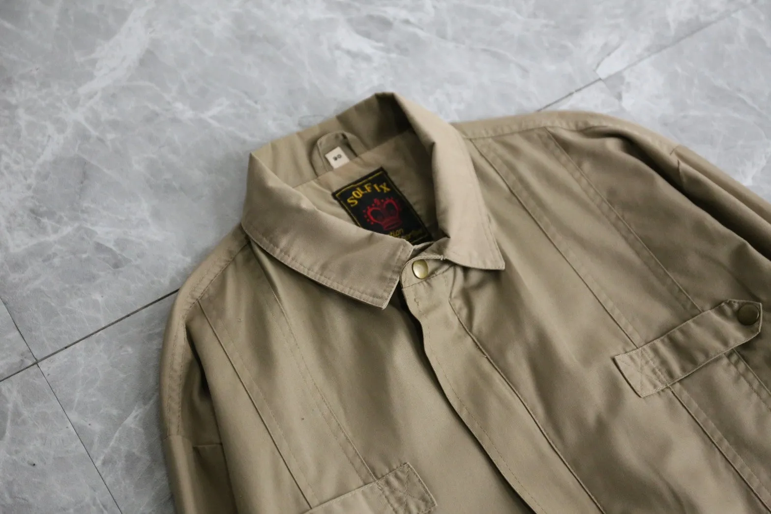 thin beige blouson